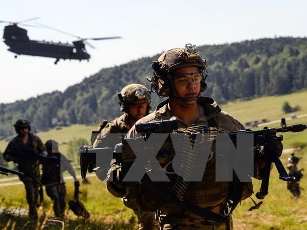 រុស្ស៊ីនិង NATO បង្កើនកម្លាំងយោធា - ảnh 1